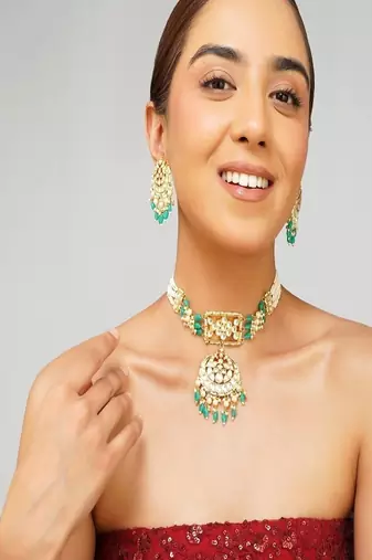 Gold plated kundan green stone necklace set