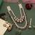 Maroon color kundan necklace set