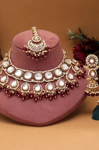 Maroon color kundan necklace set