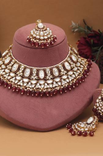 Maroon color kundan necklace set