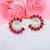 Red color american diamond earrings