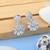 Silver color american diamond earrings