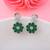 Green color american diamond earrings