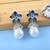 Blue color american diamond earrings