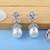 Pink color american diamond earrings