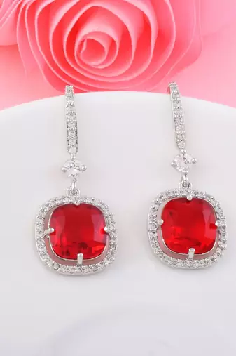 Red color american diamond earrings