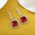 Red color american diamond earrings