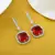 Red color american diamond earrings