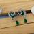 Green color american diamond earrings