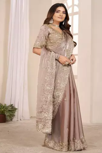Chiku embroidered georgette saree