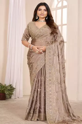 Chiku embroidered georgette saree
