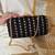 Black silk embroidered clutch