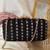 Black silk embroidered clutch