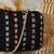 Black silk embroidered clutch