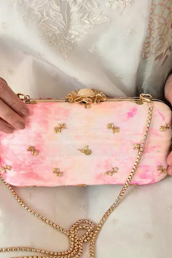 Pink silk embroidered clutch