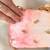 Pink silk embroidered clutch