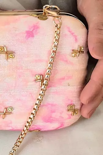 Pink silk embroidered clutch