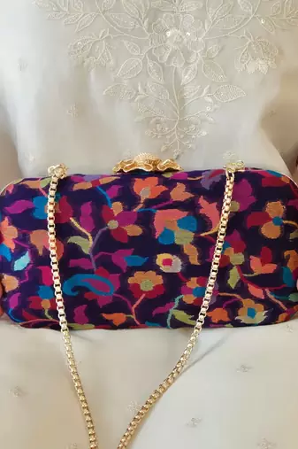Blue wool floral embroidered clutch