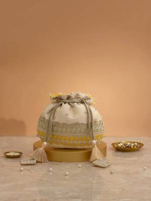 Yellow silk floral embroidered potli bag 1