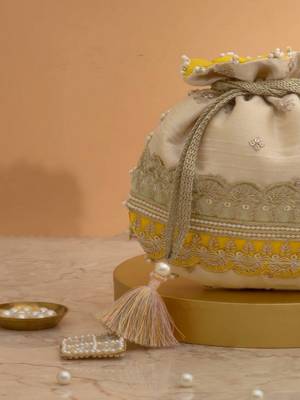 Yellow silk floral embroidered potli bag 2