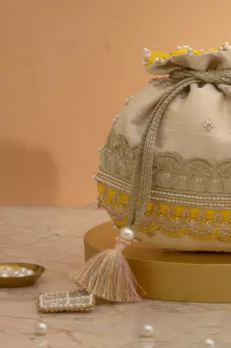 Yellow silk floral embroidered potli bag