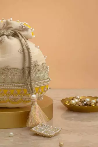 Yellow silk floral embroidered potli bag