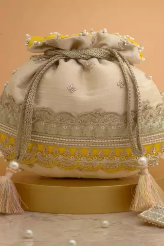 Yellow silk floral embroidered potli bag