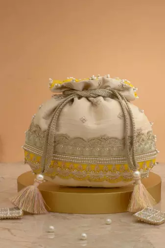 Yellow silk floral embroidered potli bag