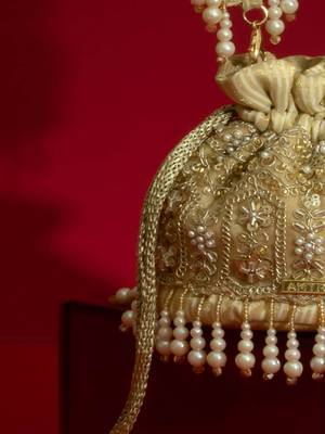 Gold silk floral embroidered potli bag 2
