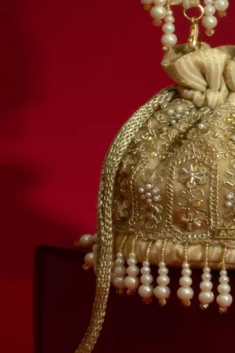 Gold silk floral embroidered potli bag