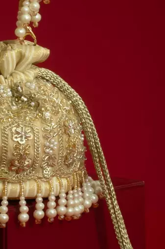 Gold silk floral embroidered potli bag