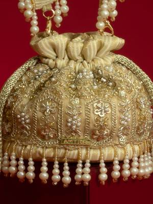 Gold silk floral embroidered potli bag 4