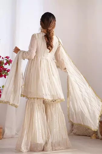 White mal chnaderi silk mirror work and hand work sharara set