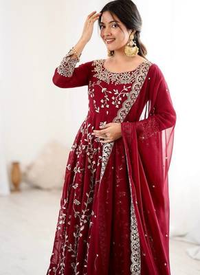 Maroon hevay faux georgette embroidery work gown 4