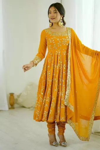Yellow hevay faux georgette embroidery work gown