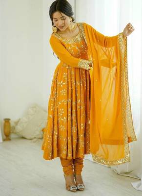 Yellow hevay faux georgette embroidery work gown 3