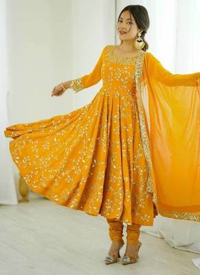 Yellow hevay faux georgette embroidery work gown 4