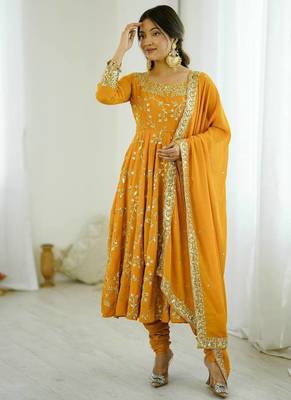 Yellow hevay faux georgette embroidery work gown 5