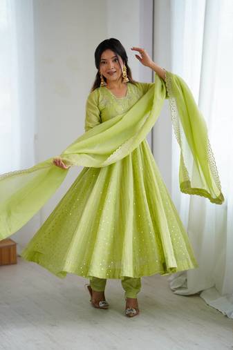 Pista green color heavy crunchy silk embroidery work gown