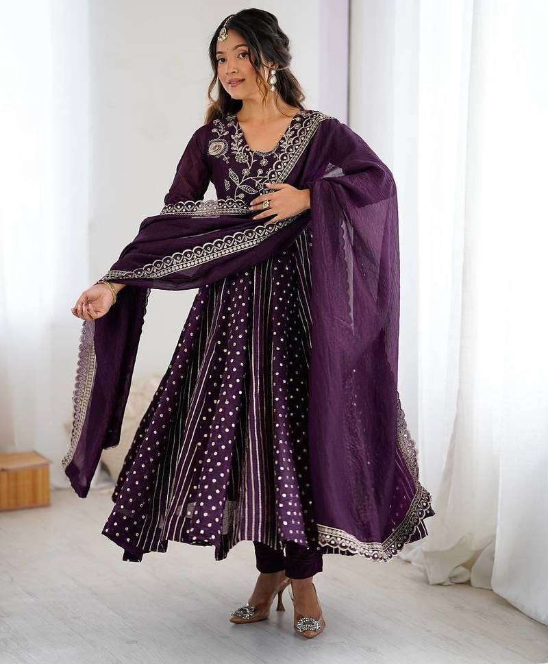 Violet color heavy crunchy silk embroidery work gown