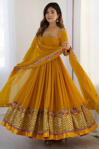 Yellow color heavy georgette wedding wear embroidery work long gown