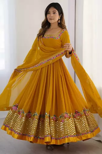 Yellow color heavy georgette wedding wear embroidery work long gown