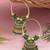 Gold plated traditional handcrafted beaded jhumka hoop earrings for women (green)