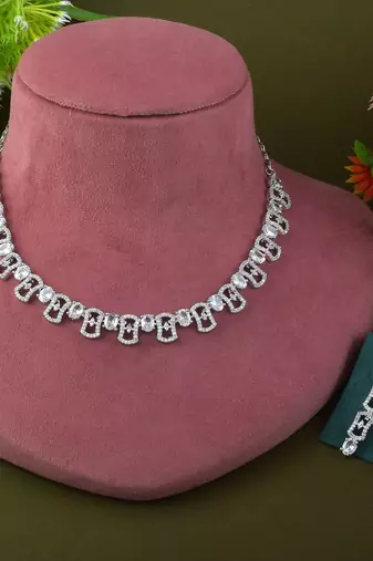 Silver color american diamond necklace set featuring graceful minimalist detailing