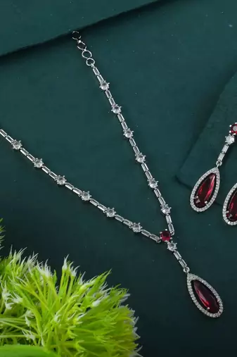 Ruby color american diamond necklace set with floral cluster arrangement