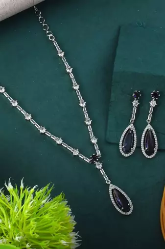 Purple color american diamond necklace set featuring intricate beaded details