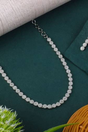 Silver color american diamond necklace set with pearl-like embellishments