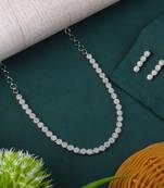Silver color american diamond necklace set with pearl-like embellishments