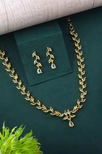 Gold color american diamond necklace set for weddings and special events