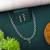 Silver color american diamond necklace set featuring crystal droplet design